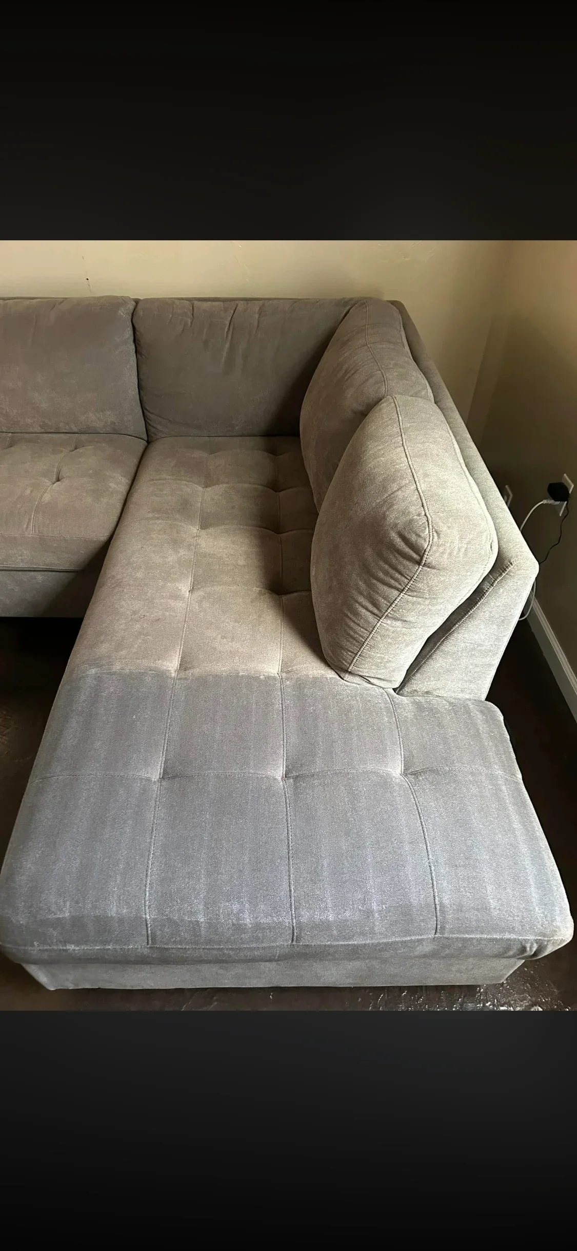Beige fabric sectional sofa with cleaned cushions and restored upholstery appearance
